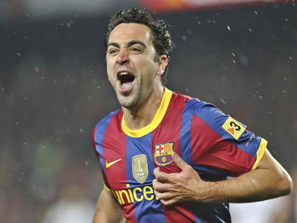 Huyền thoại Xavi Hernandez điều tiết lối chơi của Barca
